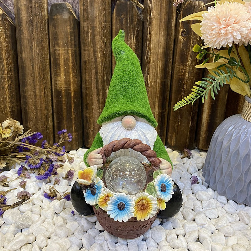 Resin Solar Powered Gnome with Flower Basket and Glass Orb Garden Illumination