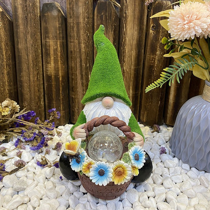 Resin Solar Powered Gnome with Flower Basket and Glass Orb Garden Illumination