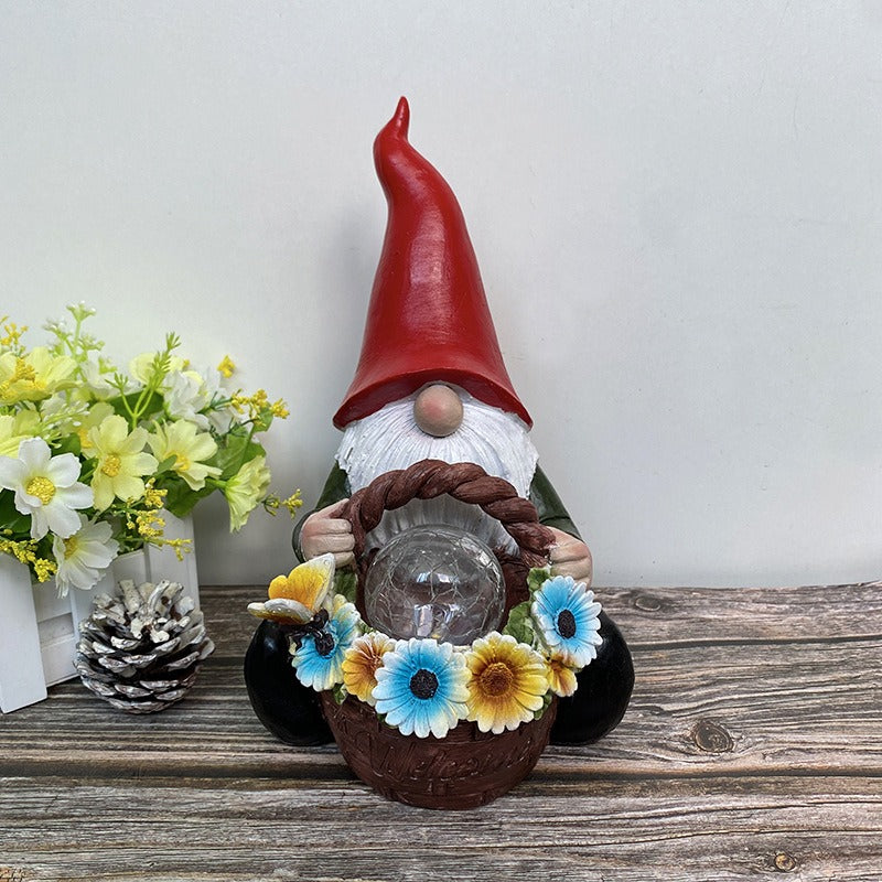 Resin Solar Powered Gnome with Flower Basket and Glass Orb Garden Illumination
